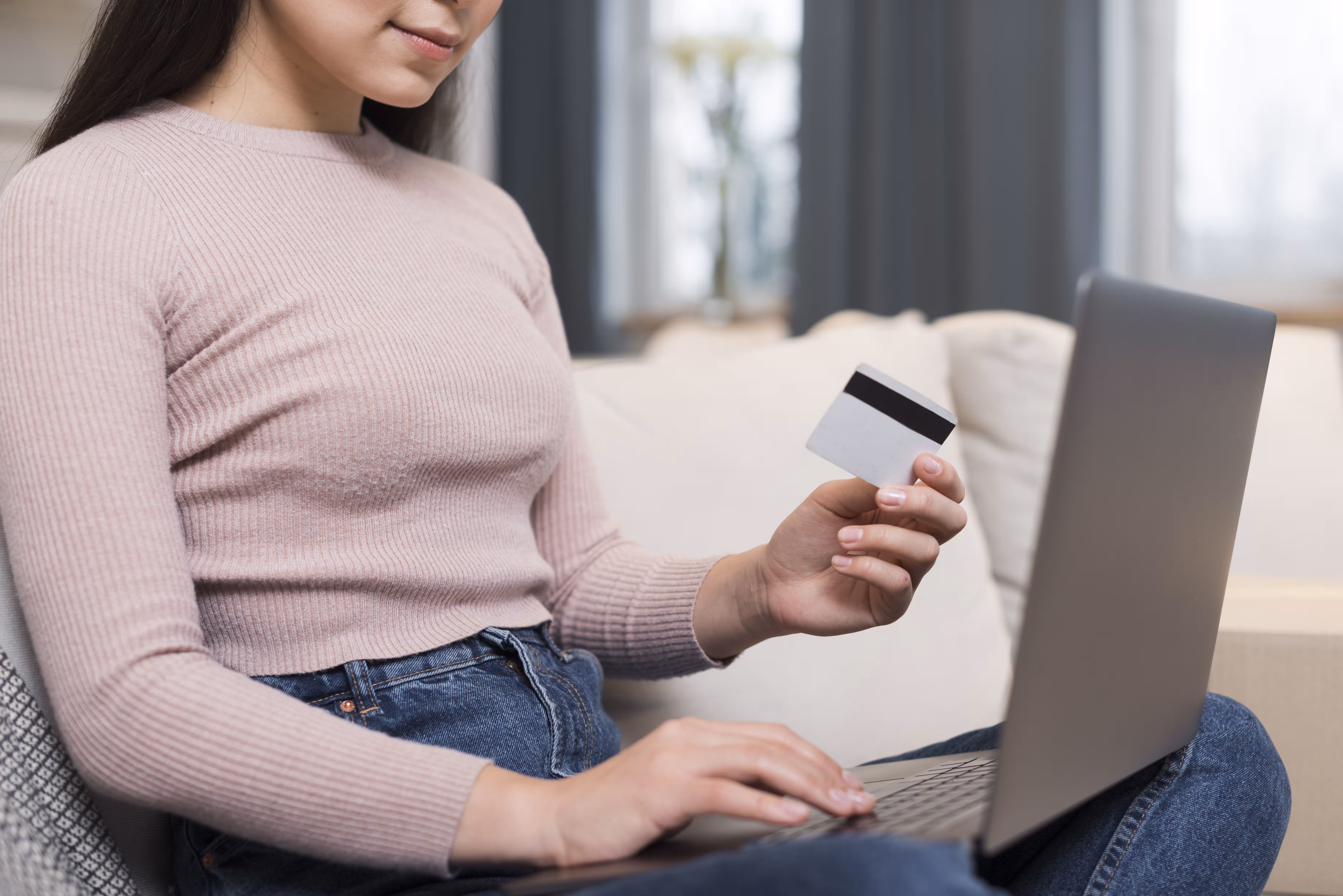 Side View Woman Ordering Online With Credit Card